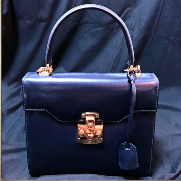 Gucci Handbags - Gucci Dark Blue Satchel with Gold Accents